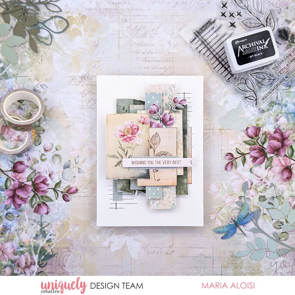 Handmade greeting card by Maria Aloisi using Uniquely Creative Floral Archives collection – features layered florals, pastel tones, and vintage textures with a central sentiment “WISHING YOU THE VERY BEST.” Surrounded by crafting supplies like floral washi tape, stamps, and die cuts for a charming, artistic presentation.